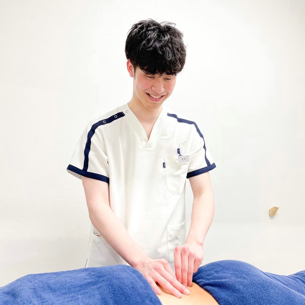 背中のこりを取り除き自律神経失調症を改善する鍼治療